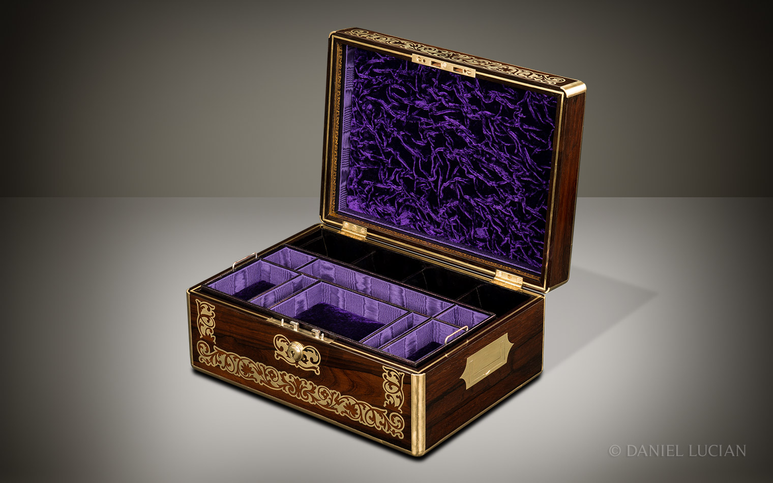 Front right interior view showing the purple velvet-lined fitted compartments.