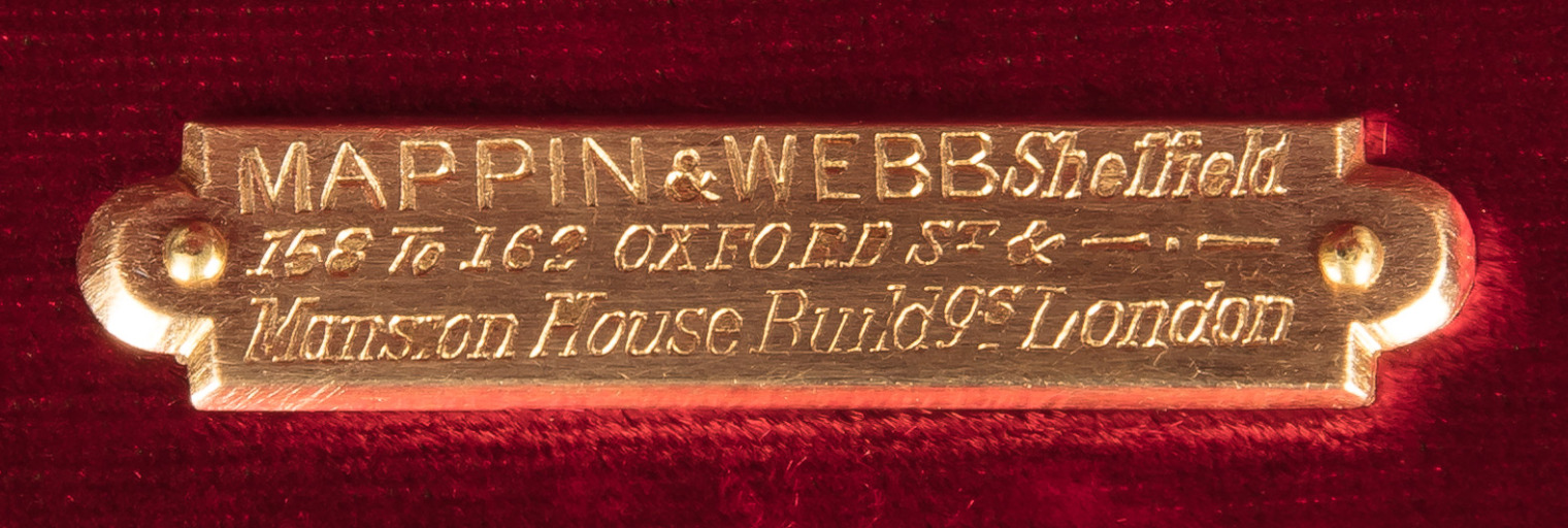 Engraved Mappin & Webb retailer’s plate for 158–162 Oxford Street and Mansion House Buildings, London.